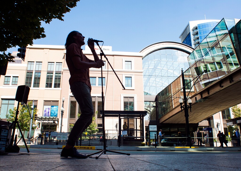 (Rick Egan  |  The Salt Lake Tribune)   Dallin McAllister performs on Main Street in Salt Lake City, Thursday, Aug. 16, 2018. The first Salt Lake Busker Festival is set for Aug. 24 on Regent Street, bringing together street musicians, magicians, jugglers and other performers.