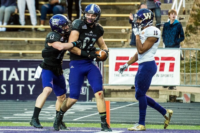 (Chris Detrick  |  The Salt Lake Tribune)  Weber State Wildcats tight end Andrew Vollert (87) and Weber State Wildcats wide receiver Drew Batchelor (13) celebrate after Vollert scored a touchdown past Western Illinois Leathernecks Tyrin Holloway (16) during the game at Stewart Stadium Saturday, November 25, 2017.  