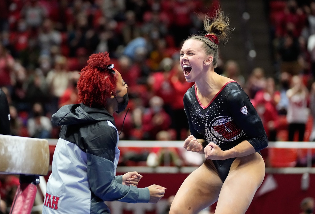 (Francisco Kjolseth | The Salt Lake Tribune) Utah’s Maile O’Keefe performs celebrates her perfect 10 on the beam during the gymnastics meet with Stanford at the Huntsman Center in Salt Lake City, Saturday, Jan. 29, 2022.
