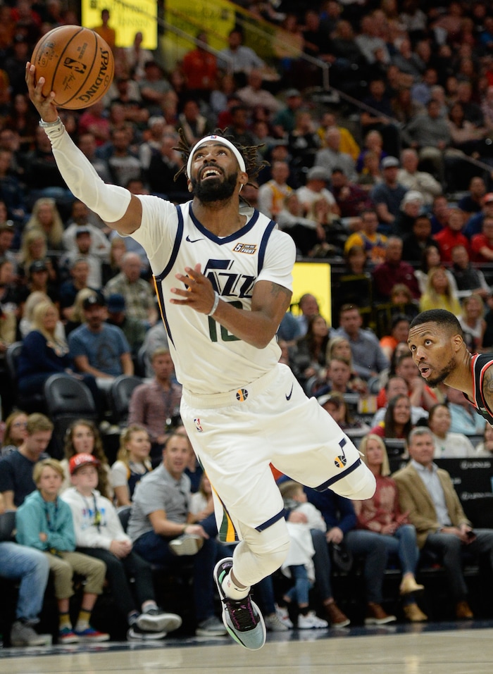 (Francisco Kjolseth  |  The Salt Lake Tribune)  Utah Jazz guard Mike Conley (10) lays one up as the Utah Jazz host the Portland Trailblazers in their NBA basketball game at Vivint Smart Home Arena in Salt Lake City on Wed. Oct. 16, 2019.