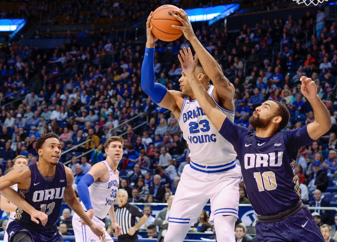 (Leah Hogsten  |  The Salt Lake Tribune) Oral Roberts Golden Eagles guard Sam Kearns (10) knocks the ball out of Brigham Young Cougars forward Yoeli ChildsÕ (23) hands. Brigham Young University defeated Oral Roberts, 79-73, Dec. 28, 2019 at the Marriott Center in Provo.