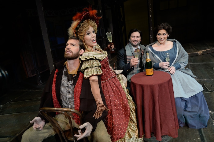 (Francisco Kjolseth  |  The Salt Lake Tribune)  Utah Opera's season opener, "La bohème," Puccini's popular tearjerker about starving artists in turn-of-the-century Paris, opens for five shows on Oct. 7, 2017. On set joking around with the staff during set photos were:  Michael Adams (Marcello), Celena Shafer (Musetta), Jennifer Black (Mimì), Scott Quinn (Rodolfo), from left.