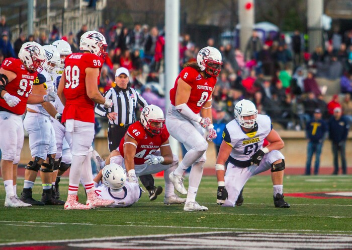 Southern Utah defensive lineman Taylor Pili (8) celebrates after sacking Northern Arizona quarterback Case Cookus (15) during an NCAA college football game Saturday, Nov. 18, 2017, in Cedar City, Utah. Southern Utah defeated Northern Arizona 48-20 to claim a share of the Big Sky Conference title. (Jordan Allred/The Spectrum via AP)