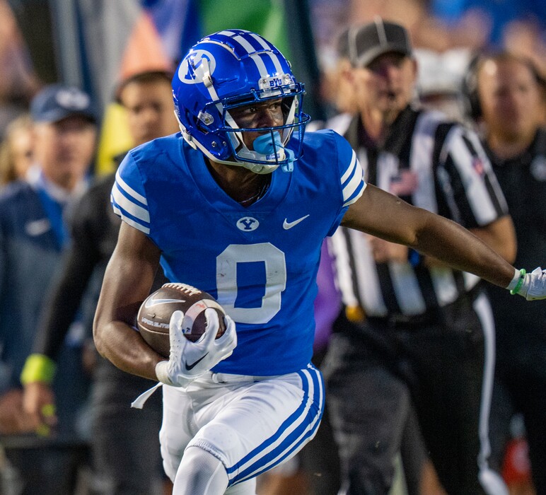 (Rick Egan | The Salt Lake Tribune) Brigham Young Cougars wide receiver Kody Epps (0) runs with the ball, in football action between the Brigham Young Cougars and the Utah State Aggies, at LaVell Edwards Stadium in Provo, on Thursday, Sept. 29, 2022.