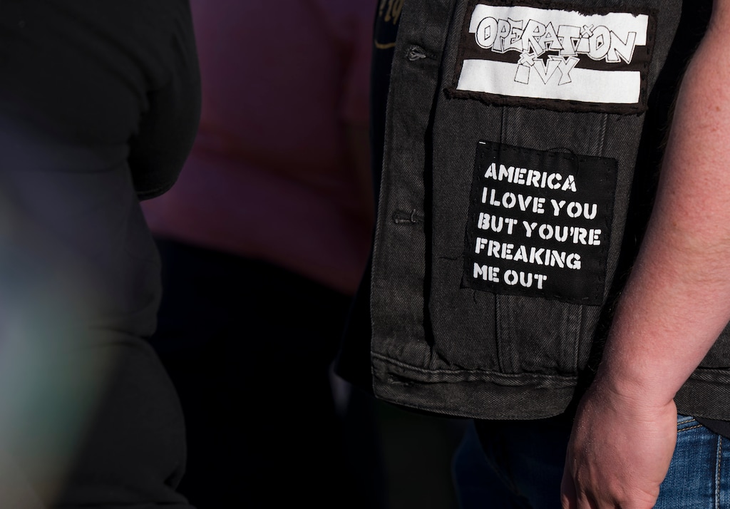 (Bethany Baker  |  The Salt Lake Tribune) A patch is seen on a protesterÕs jacket at the warehouse purchased for U.S. Immigration and Customs Enforcement in Salt Lake City on Wednesday, March 18, 2026.