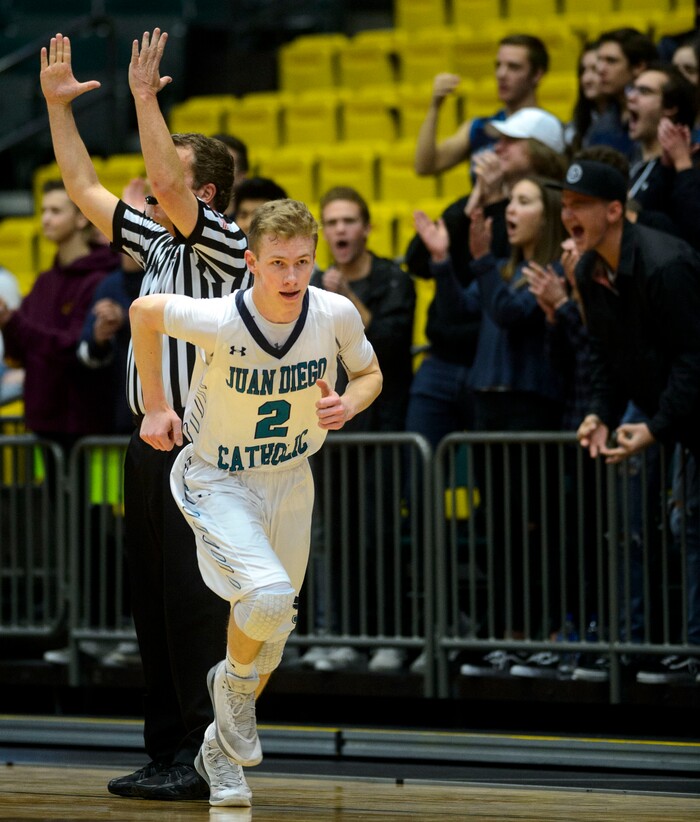 (Steve Griffin | The Salt Lake Tribune) Juan Diego's Matt Kitzman (2) heads back up court after nailing a three-pointer during 4A basketball playoff game at the Utah Valley UniversityÕs UCCU Center in Provo Thursday March 1, 2018.