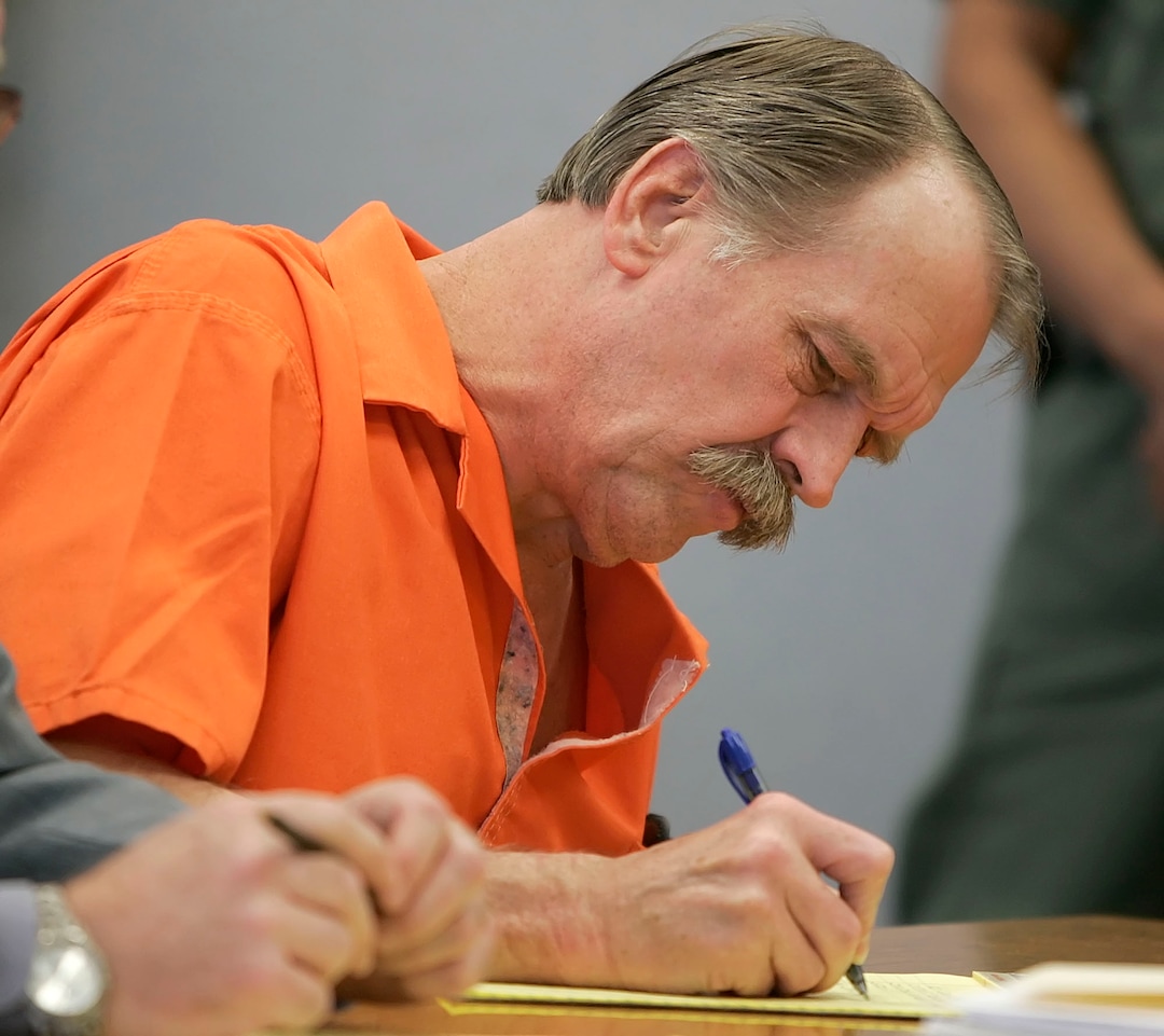 (George Frey  |  AP Photo) Ron Lafferty takes notes during his court hearing in the 4th District Courtroom of Judge Anthony Schofield in Provo, Utah, Thursday, Oct. 6, 2005.  Lafferty is trying to get his conviction overturned from the 1984 double murders of his sister-in-law and her 15 month old child.