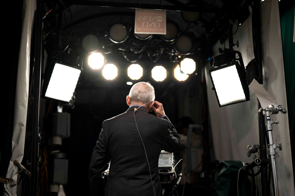 (Doug Mills | The New York Times) 

Dr. Anthony Fauci as he does TV interviews on the North Lawn of the White House, in March 2020.