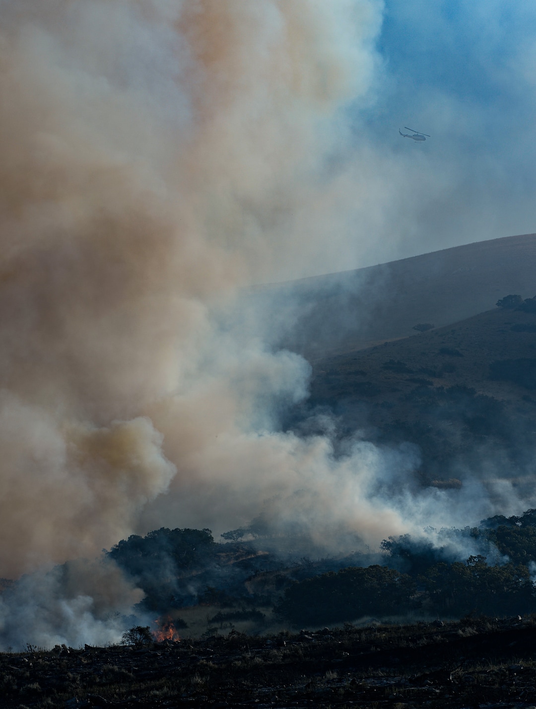 (Francisco Kjolseth  |  The Salt Lake Tribune)  Fire crews battle a fire in Davis County in Utah on the East Bountiful bench that grew to 150 acres early Friday morning, Aug. 30, 2019, and destroyed three homes. On Sept. 2, officials said the fire was 100% contained.
