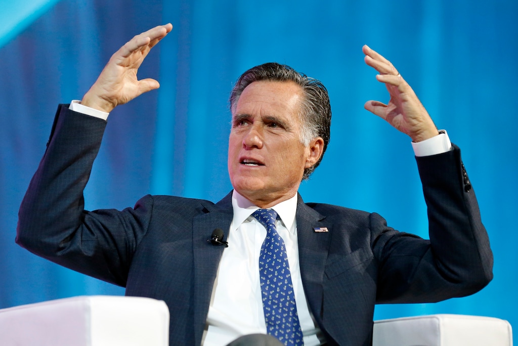 FILE - In this Jan. 19, 2018, file photo, former Republican presidential candidate Mitt Romney speaks about the tech sector during an industry conference, in Salt Lake City. Romney plans to announce his Utah Senate campaign Thursday, Feb. 15, 2018. Three people with direct knowledge of the plan say Romney will formally launch his campaign in a video. (AP Photo/Rick Bowmer, File)