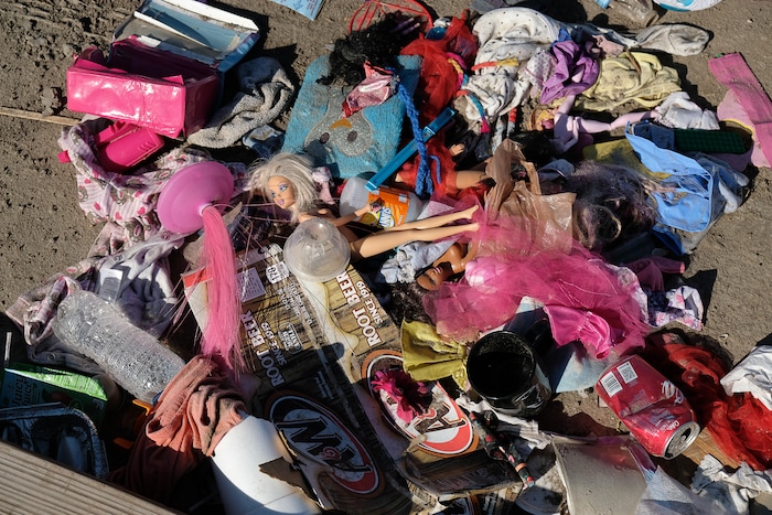 (Francisco Kjolseth  |  The Salt Lake Tribune)  Remains of a removed transient camp litter the ground in West Salt Lake City as members of One Voice Recovery and the Volunteers Of America are left to keep looking for those in need of services and support as they make the rounds on Monday, Oct. 16, 2017. 