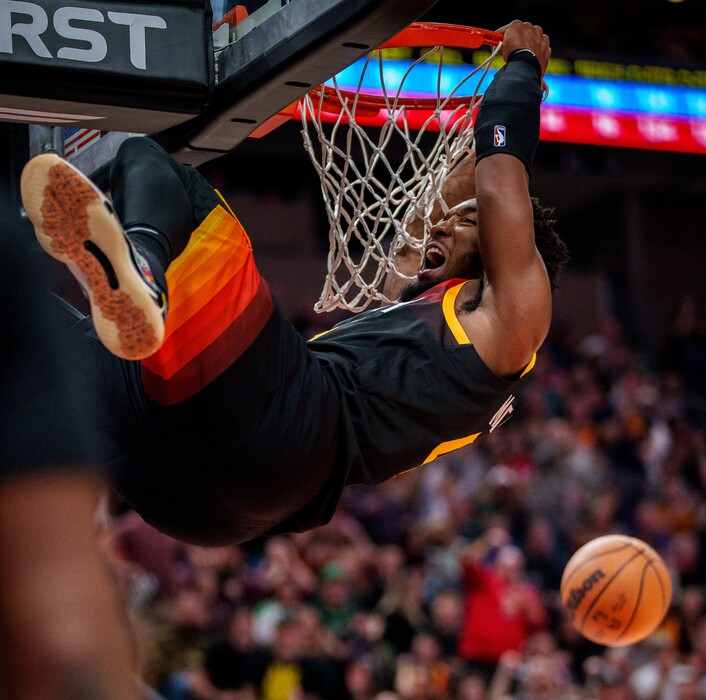 (Trent Nelson  |  The Salt Lake Tribune) Utah Jazz guard Donovan Mitchell (45) dunks as the Utah Jazz host the Boston Celtics, NBA basketball in Salt Lake City on Friday, Dec. 3, 2021.