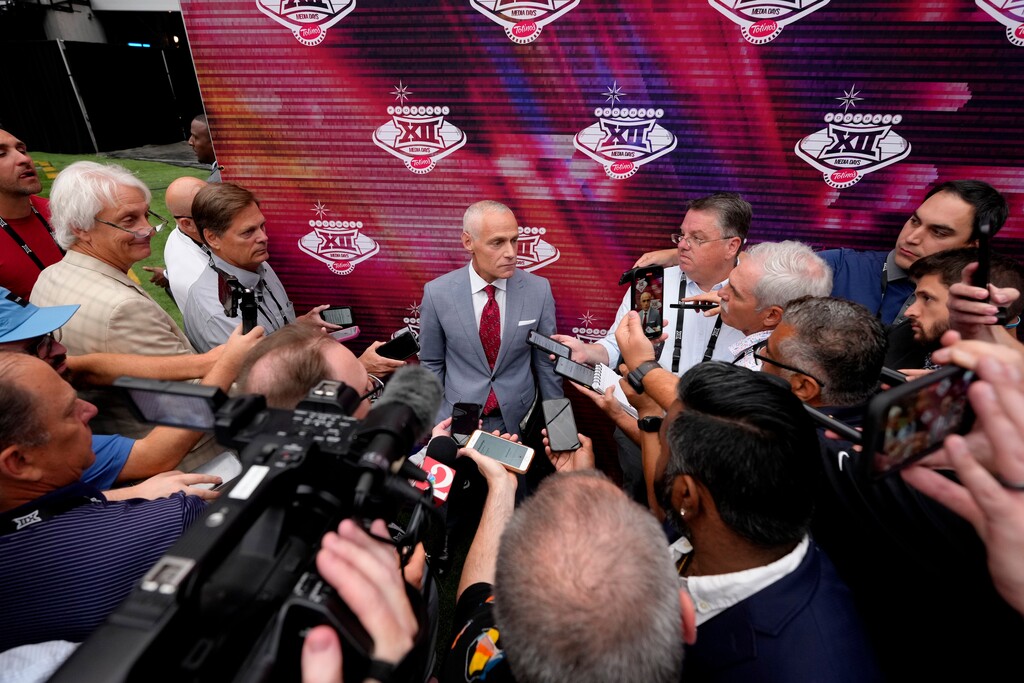 (Lucas Peltier | AP) Big 12 Commissioner Brett Yormark answers questions from the media during the Big 12 NCAA college football media days in Las Vegas, Tuesday, July 9, 2024.