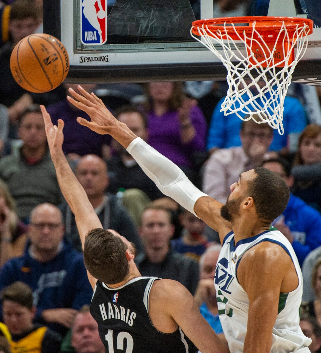 (Rick Egan  |  The Salt Lake Tribune)        Utah Jazz center Rudy Gobert (27) blocks a shot by Brooklyn Nets forward Joe Harris (12) , in NBA basketball action between the Utah Jazz and the Brooklyn Nets in Salt Lake City, Tuesday, Nov 12, 2019.