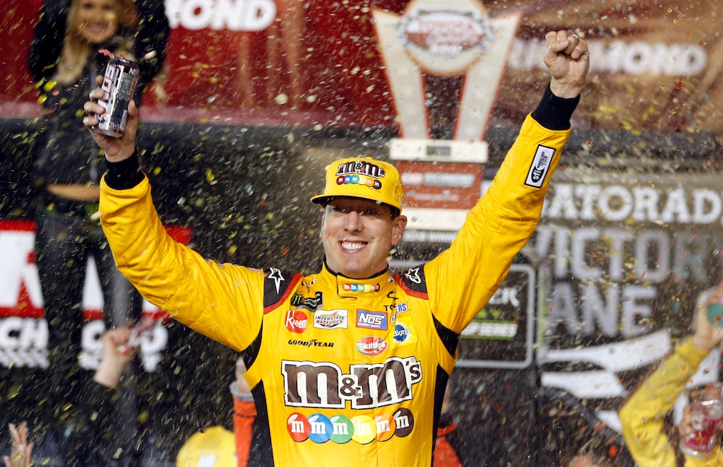 Kyle Busch celebrates in Victory Lane after winning the NASCAR Cup Series auto race at Richmond Raceway in Richmond, Va., Saturday, April 21, 2018. (AP Photo/Steve Helber)