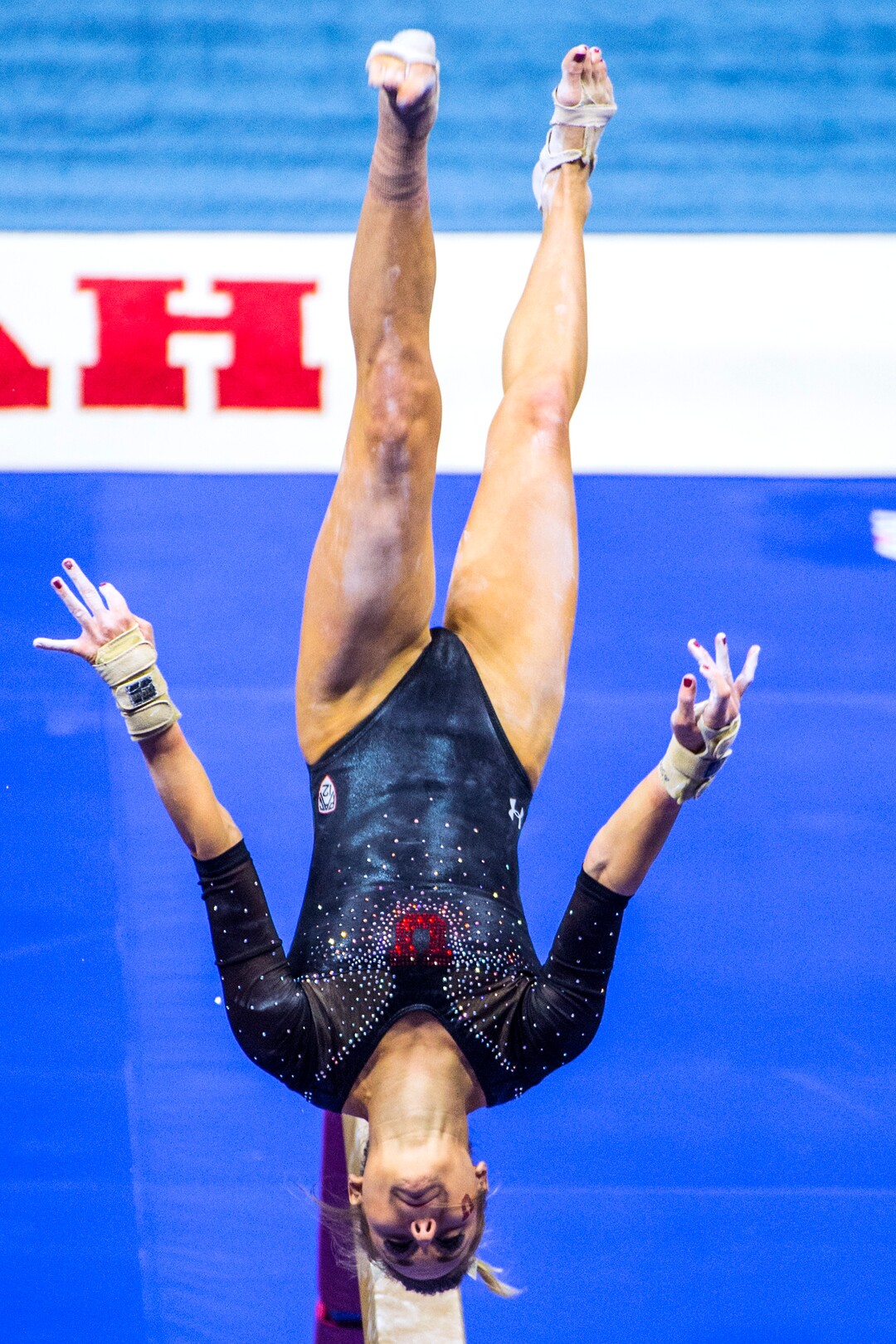 Chris Detrick  |  The Salt Lake TribuneUtah gymnast Tiffani Lewis performs on the beam during the Red Rocks Preview at the Huntsman Center Friday December 11, 2015.  