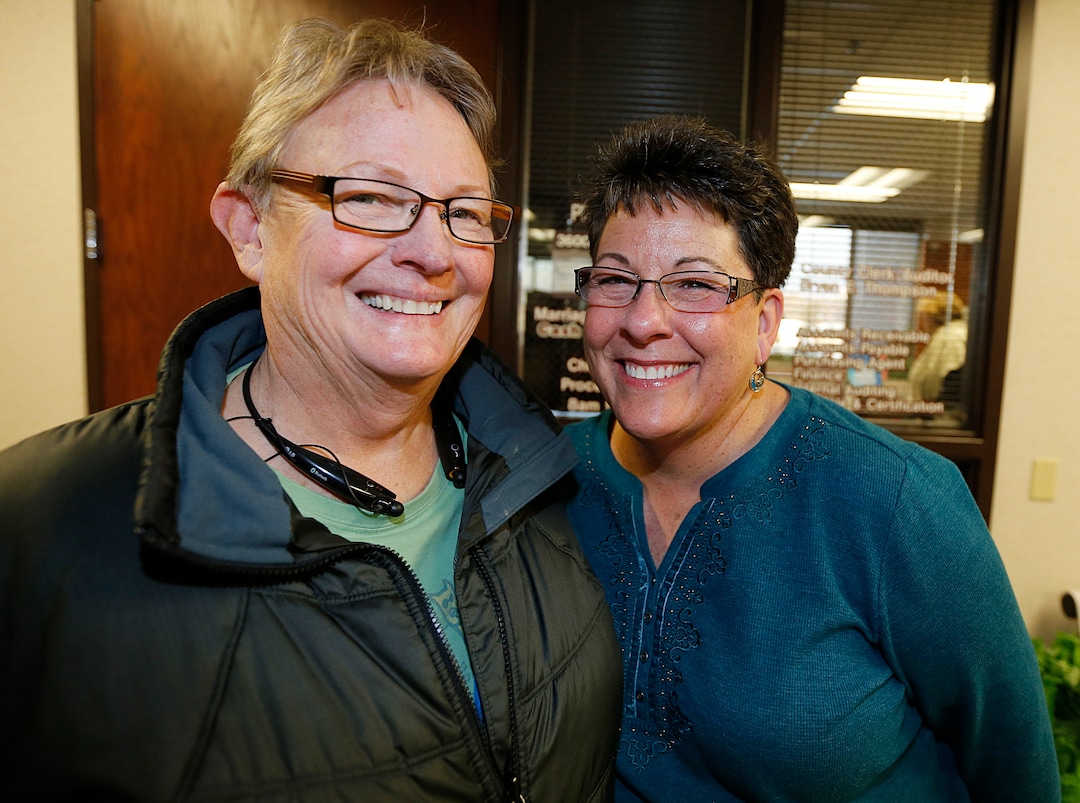  Arlene Arnold left  Loreen Major right from Lehi, Utah, smile as they leave the offices of the Utah County Clerk and Auditor office after receiving a rejection letter for a marriage license on July 20, 2013 in Provo, Utah. A Federal Judge on Friday struck down Utah's ban on same sex marriage saying the law violates the U.S. Constitution.  (Photo by George Frey  |  Special to the Tribune)