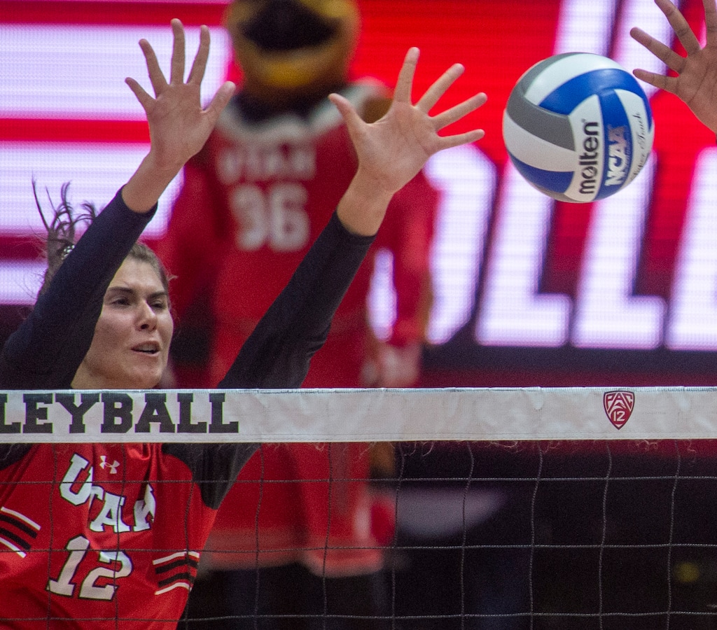 (Rick Egan  |  The Salt Lake Tribune)   Utah senior Berkeley Oblad blocks a ball during the Utes' loss to BYU at the Huntsman Center in September.