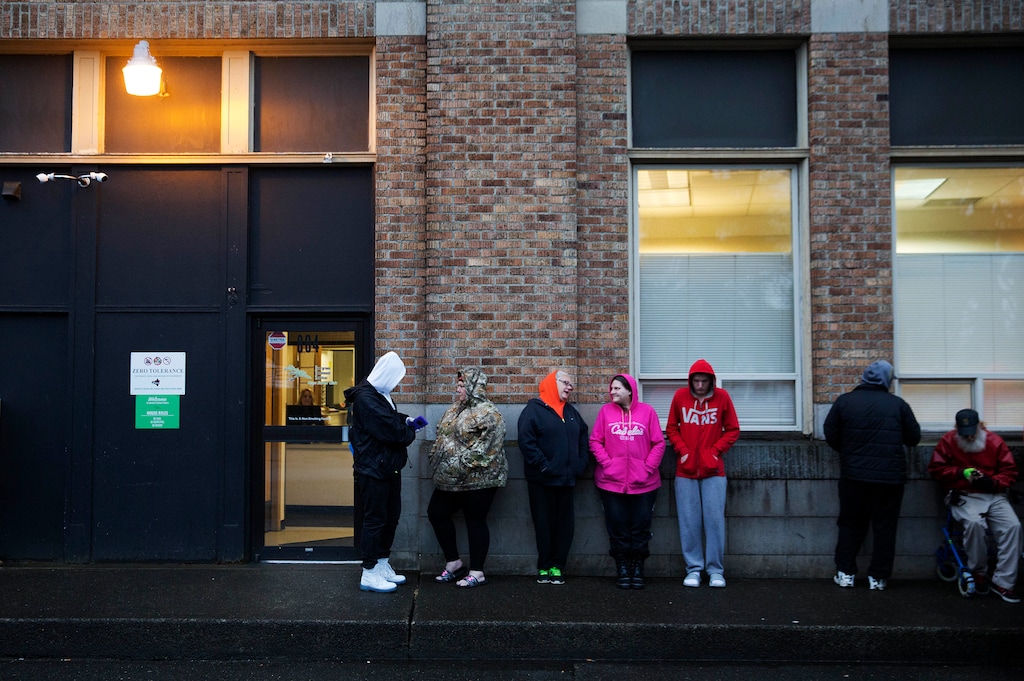 (David Goldman | AP file photo) People wait in line for the Evergreen Treatment Services methadone clinic to open in Hoquiam, Wash., Thursday, June 15, 2017.