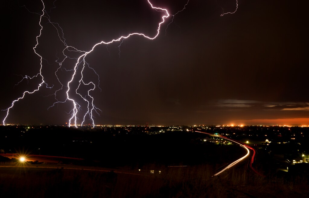 (Leah Hogsten  |  The Salt Lake Tribune)  An evening thunderstorm rolls through the Wasatch Front, Tuesday, July 10, 2018.