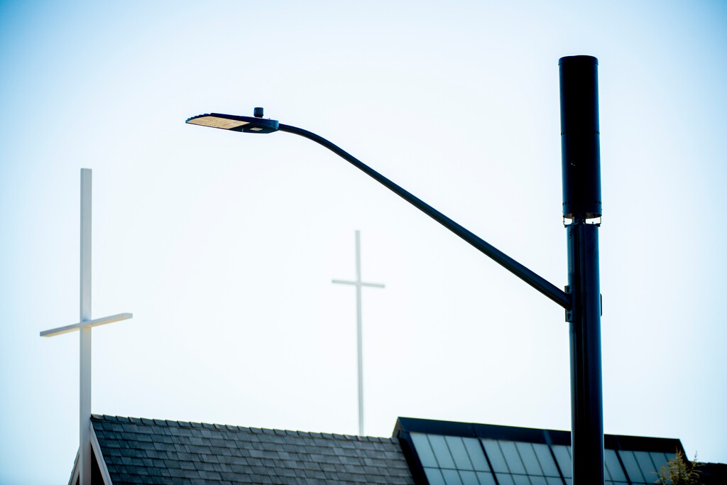 (Isaac Hale | Special to The Tribune) A 5G cell tower antenna stands atop a streetlight post in front of Zion Evangelical Lutheran Church in Salt Lake City on Wednesday, March 3, 2021.