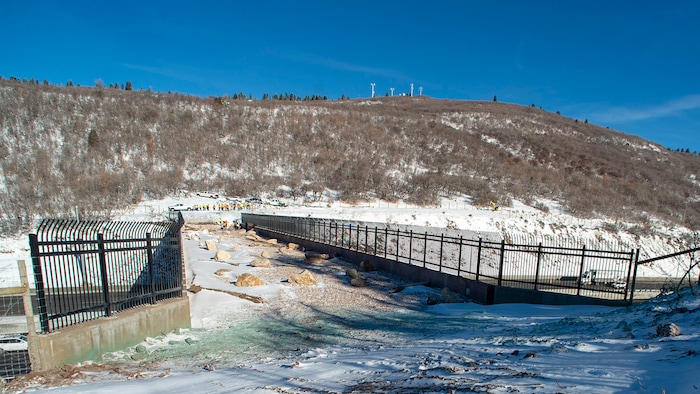 (Rick Egan  |  The Salt Lake Tribune)     UDOT personal and reporters check out the  first overpass for wildlife at the summit of Parleys Canyon crosses I-80 near Exit 140.  Wednesday, Dec. 12, 2018.


