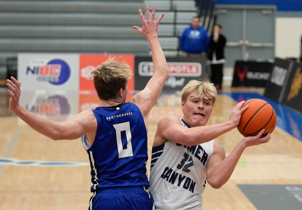 (Francisco Kjolseth | The Salt Lake Tribune) Max Toombs (32) of Corner Canyon goes up against Carson Bailey (0) of Bingham as they compete in the 5 For Fight National Hoopfest Utah County tournament at Pleasant Grove High School on Tuesday, Nov. 22, 2022.