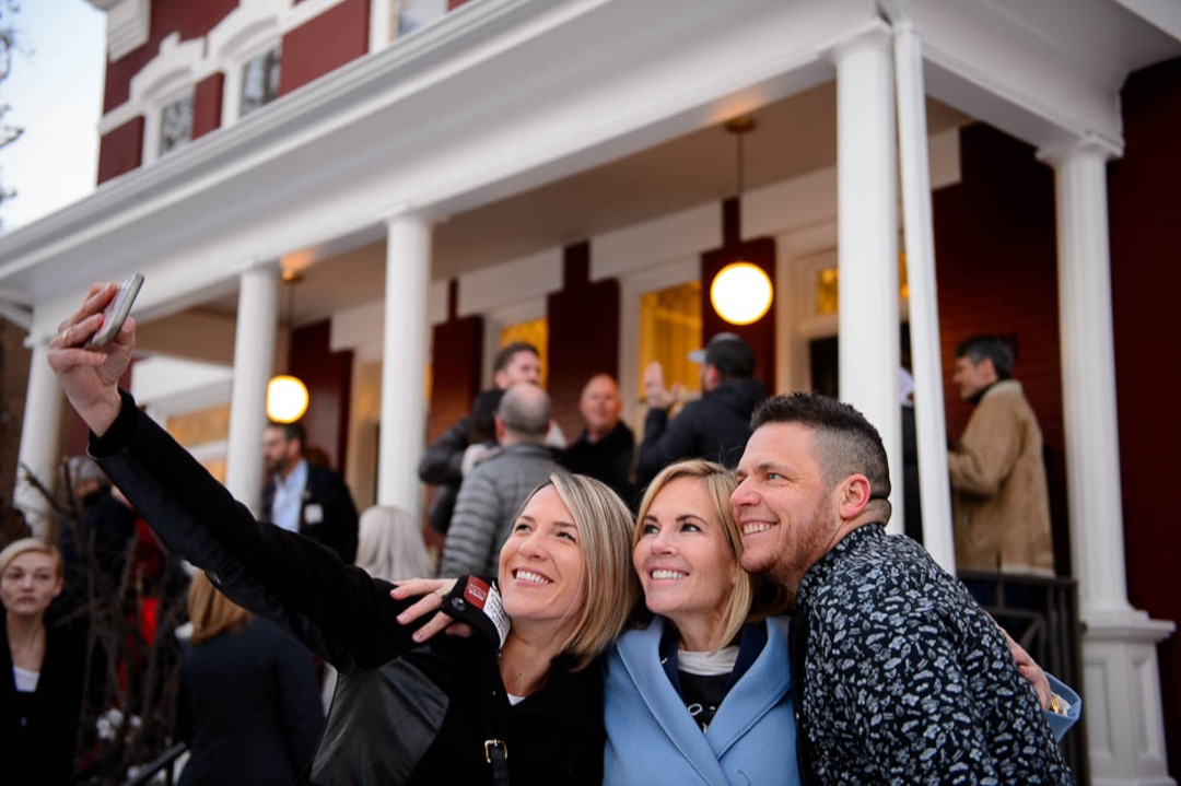 (Trent Nelson | The Salt Lake Tribune)  Stephenie Larsen, center, poses for a photo with Kaylene and Kris Packer as Encircle: LGBTQ+ Family and Youth Resource Center opens its second location in Salt Lake City on Friday February 8, 2019. Larsen is the founder of Encircle.