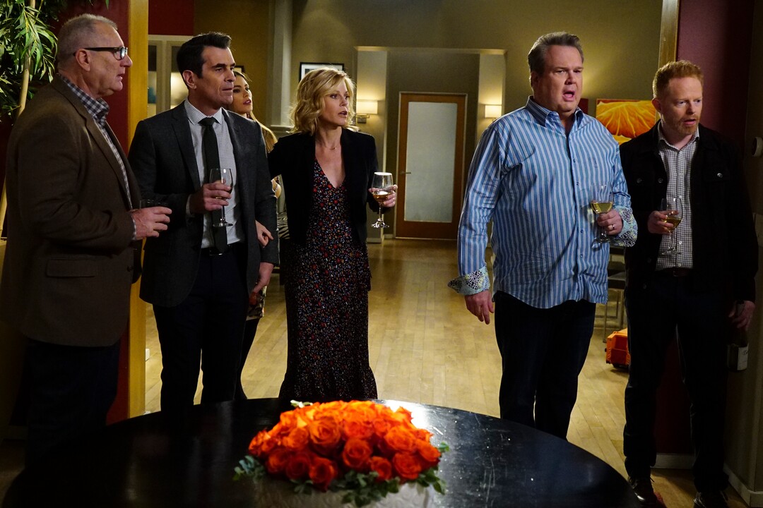 This image released by ABC shows, from left, Ed O'Neill, Ty Burrell, Sofia Vergara, obscured, Julie Bowen, Eric Stonestreet and Jesse Tyler Ferguson in a scene from "Modern Family." ABC's "Modern Family," the five-time Emmy Award winner for best comedy, will end its run next year after 11 seasons. ABC Entertainment President Karey Burke announced the end of the series about the boisterous extended family on Tuesday. (Richard Cartwright/ABC via AP)