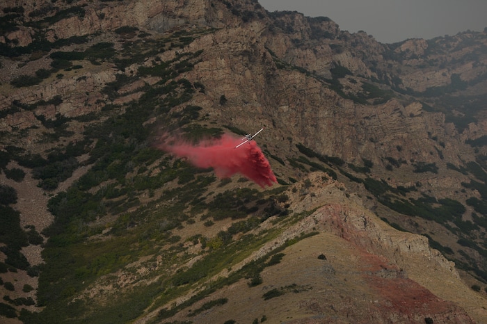(Francisco Kjolseth  |  The Salt Lake Tribune)  Crews battle a grass fire in Tooele county being dubbed the Green Ravine fire as it burns on Tuesday, Sept. 3, 2019.