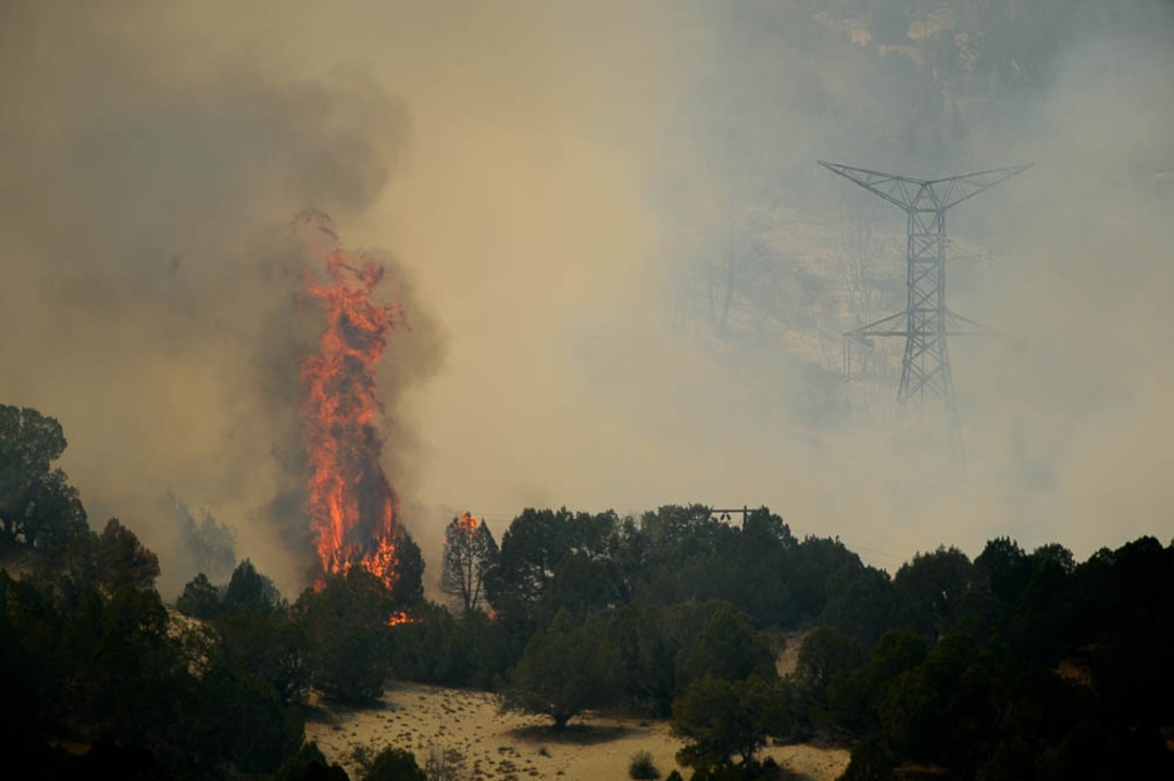 (Trent Nelson | The Salt Lake Tribune) The Coal Hollow Fire burns along Highway 6 in Utah County, Thursday Aug. 9, 2018.