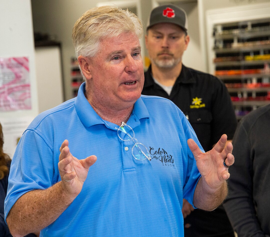 (Rick Egan  |  The Salt Lake Tribune)    Surrounded by other small business owners, Doug Jardine owner of Color My Nails Salon, talks about the impact COVID-19 is having on small businesses, during. news conference at his salon in Midvale, Wednesday, March 25, 2020.