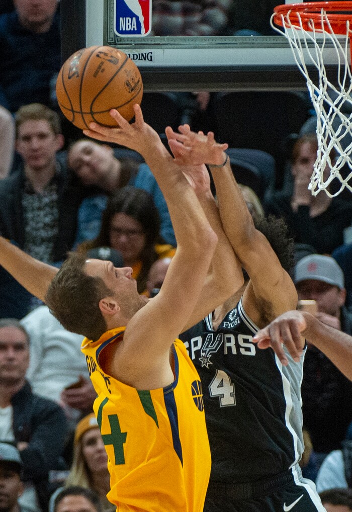 (Rick Egan  |  The Salt Lake Tribune)    
San Antonio Spurs guard Derrick White (4) makes contact with Utah Jazz forward Bojan Bogdanovic (44) on a play that ended up being a jump ball, in NBA action between the Utah Jazz and the San Antonio Spurs, in Salt Lake City, Friday, Feb. 21, 2020.