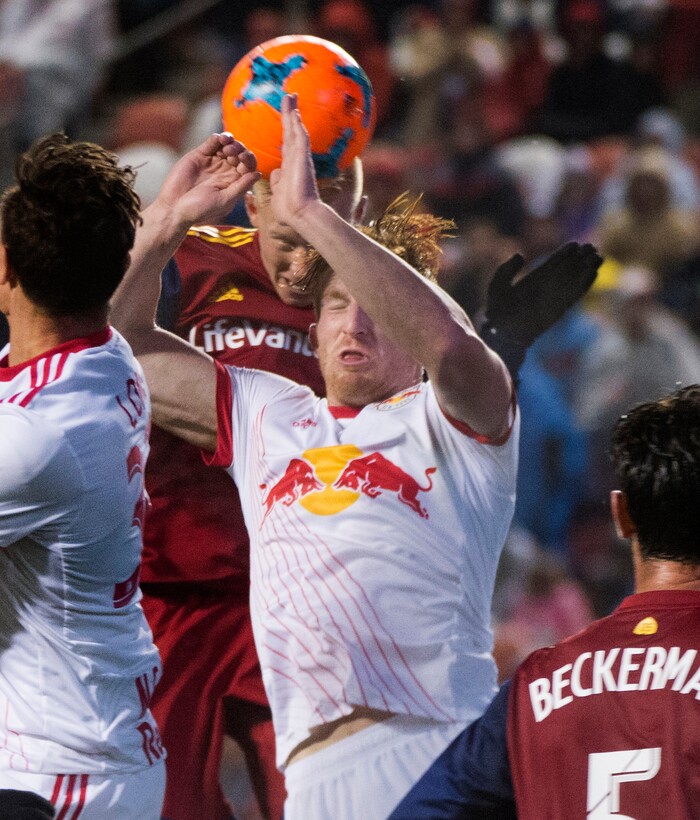 (Rick Egan  |  The Salt Lake Tribune)      Real Salt Lake defender Justen Glad (15) and New York Red Bulls defender Tim Parker (26) go for the ball on a corner kick, in MLS action between Real Salt Lake and New York Red Bulls at Rio Tinto Stadium, Saturday, March 17, 2018.


