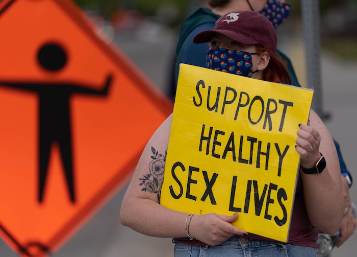 (Francisco Kjolseth | The Salt Lake Tribune) Kris Plumb joins a group protesting to petition the First Presidency to repeal the excommunication of Natasha Helfer, a sex therapist who lost her membership in The Church of Jesus Christ of Latter-day Saints. The group gathered outside the Church offices in a peaceful protest on Friday, May 7, 2021.
