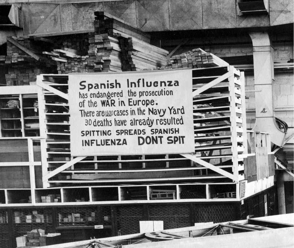 (U.S. Naval History and Heritage Command via AP)

In this Oct. 19, 1918, photo provided by the U.S. Naval History and Heritage Command a sign is posted at the Naval Aircraft Factory in Philadelphia that indicates the Spanish Influenza was then extremely active.