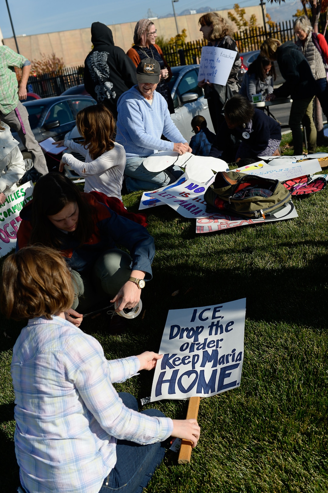 (Francisco Kjolseth  |  The Salt Lake Tribune)  Community members rally in front of the Immigration and Customs Enforcement offices in West Valley City on Monday, Oct. 16, 2017, to support Maria Santiago Garcia, a single Utah mother of four U.S. born children who faces an impending deportation order.