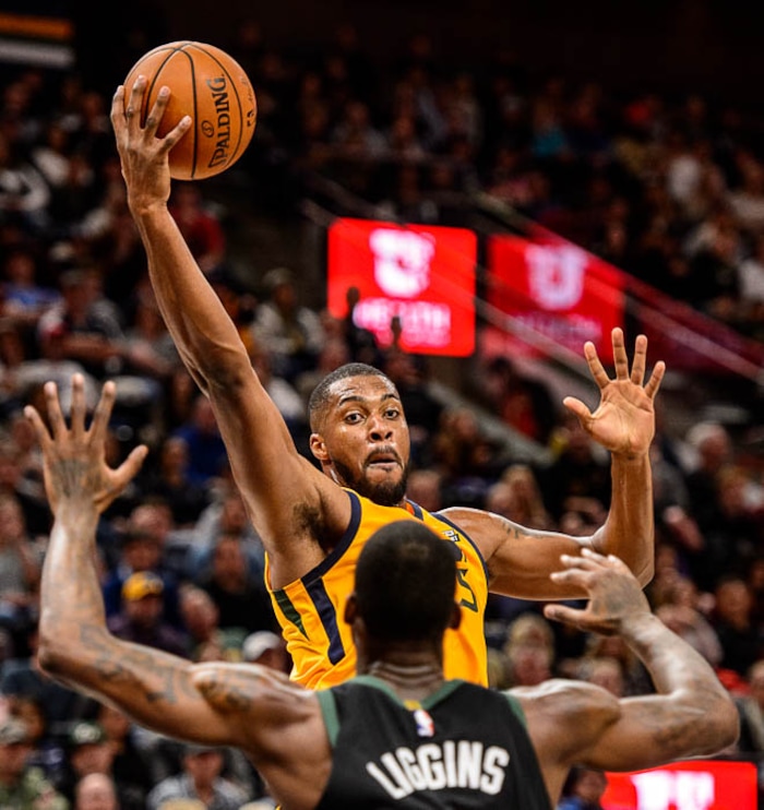 (Trent Nelson | The Salt Lake Tribune)  Utah Jazz forward Derrick Favors (15) reaches for the ball as the Utah Jazz host the Milwaukee Bucks, NBA basketball in Salt Lake City Saturday November 25, 2017.