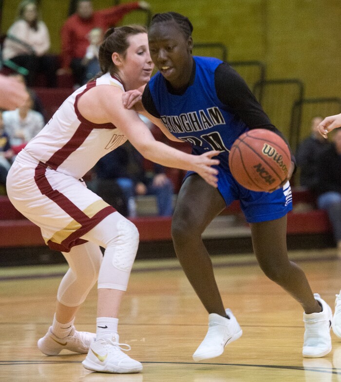 (Rick Egan  |  The Salt Lake Tribune)    Bingham High guard, Shanyce Makuei (20) takes the ball downcourt, as Mercedes Staples (12),  defends for Viewmont, in prep basketball action, Bingham vs. Viewmont, in Bountiful, Wednesday, January 3, 2018.