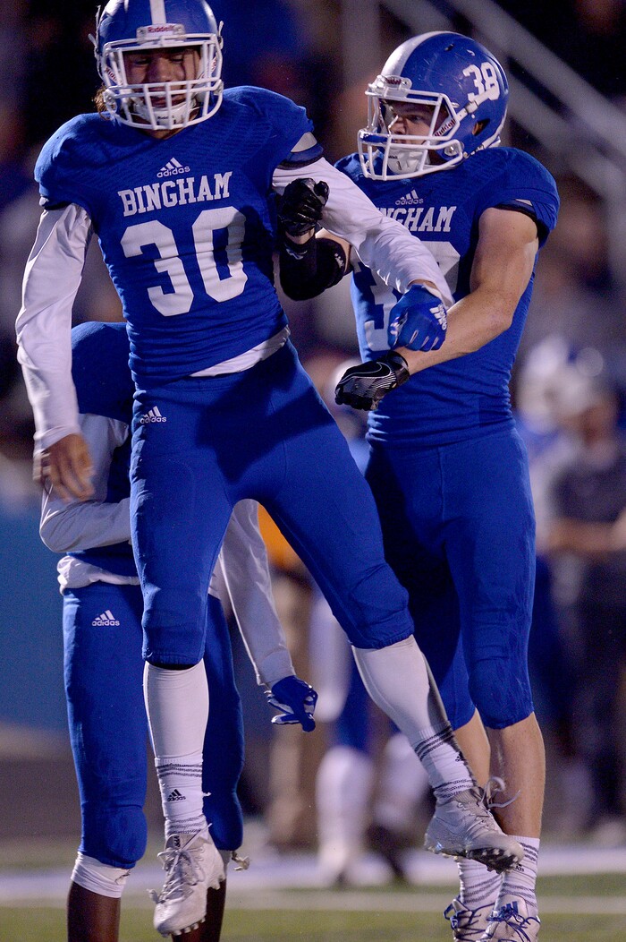 (Leah Hogsten | The Salt Lake Tribune) Bingham's Kobi Matagi celebrates his interception in the second half. Bingham High School defeated Lone Peak High School, 28-10 during their game Friday, September 28, 2017 in South Jordan.