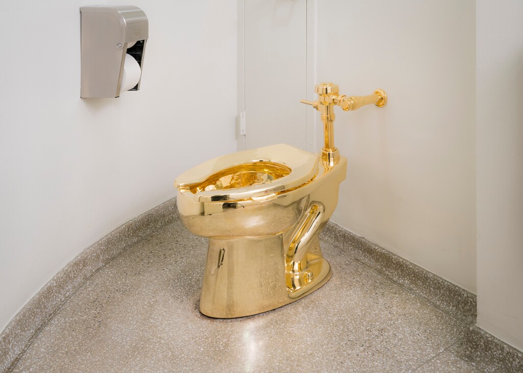 (Photo courtesy of Solomon R. Guggenheim Foundation/© Solomon R. Guggenheim Foundation) Maurizio Cattelan's "America", is a solid gold, fully functioning toilet that was installed in the Solomon R. Guggenheim Museum in 2016. The museum's curator offered it to the Trumps for use in the White House.
