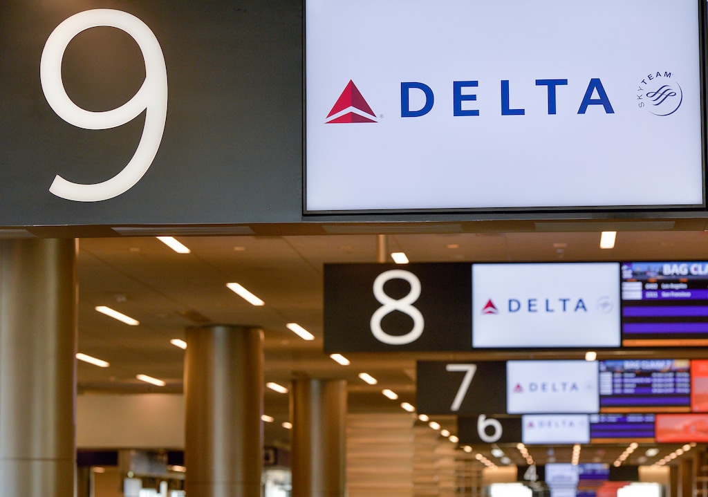 (Chris Samuels | The Salt Lake Tribune) Delta Air Lines signage at the baggage claim area in Salt Lake City International Airport, Wednesday, Oct. 12, 2022.