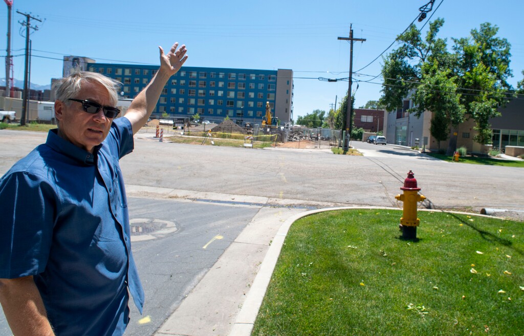 (Rick Egan  |  The Salt Lake Tribune)    Gary James Bergera talks about the effect the Beck Street Transmissions Project will have on the 400 North neighborhood,Friday, July 5, 2019.