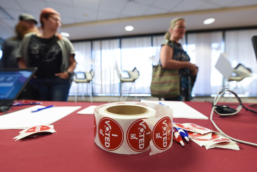 (Francisco Kjolseth  |  The Salt Lake Tribune)  People arrive to vote at the Salt Lake County complex for primary election day on Tuesday, June 26, 2018.