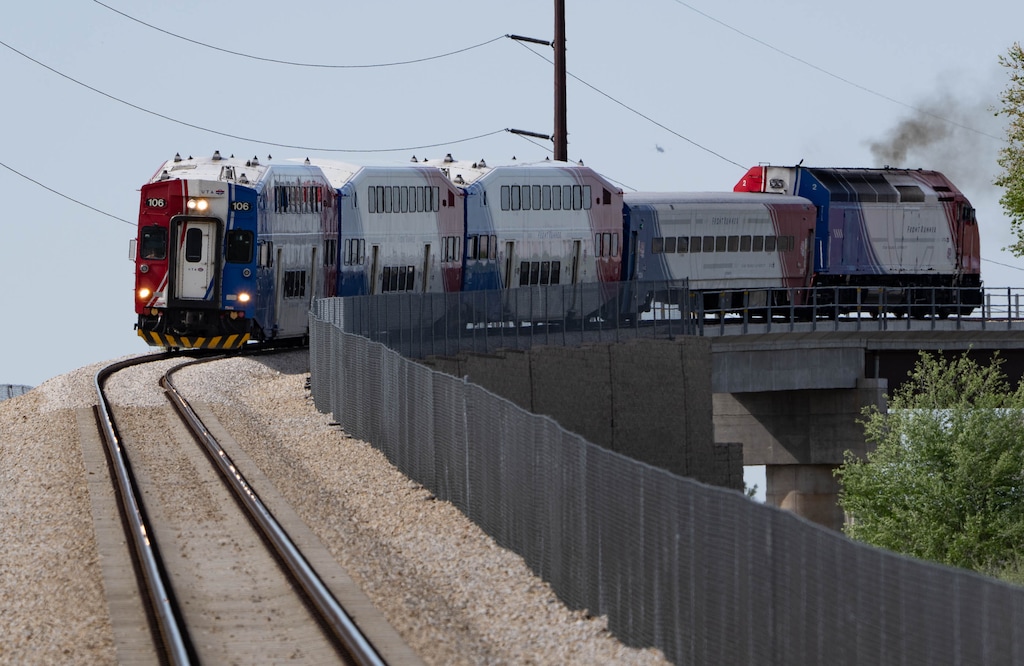 (Francisco Kjolseth | The Salt Lake Tribune) The FrontRunner commuter train nears the South Jordan Station on Thursday, May 6, 2021. Utah Gov. Spencer Cox says he wants to bring more passenger rail systems to Utah.