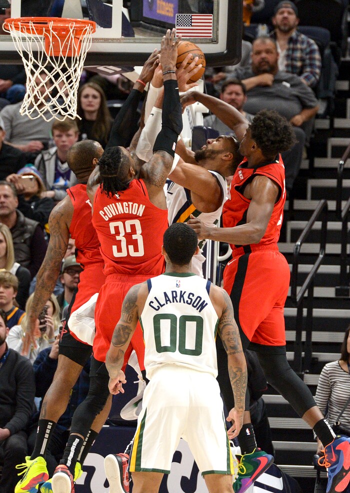(Leah Hogsten  |  The Salt Lake Tribune)  Utah Jazz center Rudy Gobert (27) is shut down at the net by the Rockets defense. The Utah Jazz lost to the Houston Rockets 110-120 at Vivint Arena, Feb. 22, 2020.