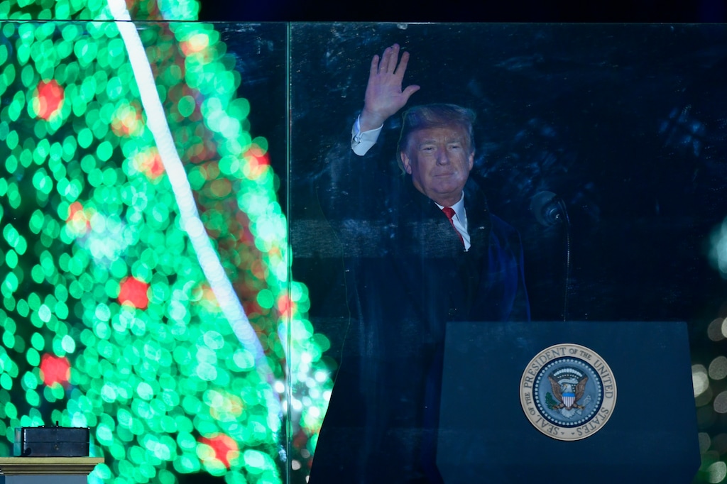 (Susan Walsh | AP) President Donald Trump waves at the annual National Christmas Tree Lighting on the Ellipse in Washington, Wednesday, Nov. 28, 2018.