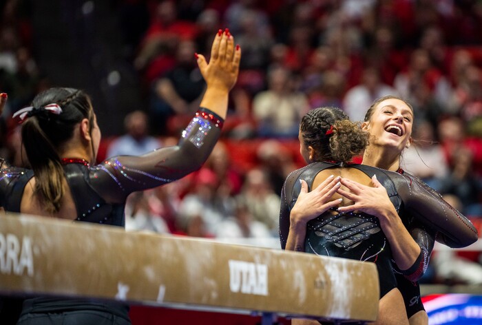 (Rick Egan | The Salt Lake Tribune)  Grace McCallum smiles after landing her dismount on the beam, in gymnastics action between Utah Red Rocks and Oregon State, at the Jon M. Huntsman Center, on Friday, Feb. 2, 2024.