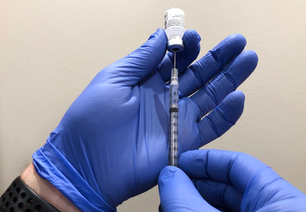 (Rick Egan | The Salt Lake Tribune)
A health care worker prepares a dose of the COVID-19 vaccine.
