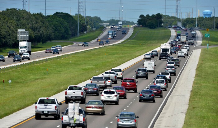 (Mike Lang | Sarasota Herald-Tribune via AP) Northbound traffic, right, on I-75 through Sarasota, Fla., is heavier than normal, but still moving on Thursday, Sept. 7, 2017. Many South Florida residents are evacuating and heading north as Hurricane Irma approaches.